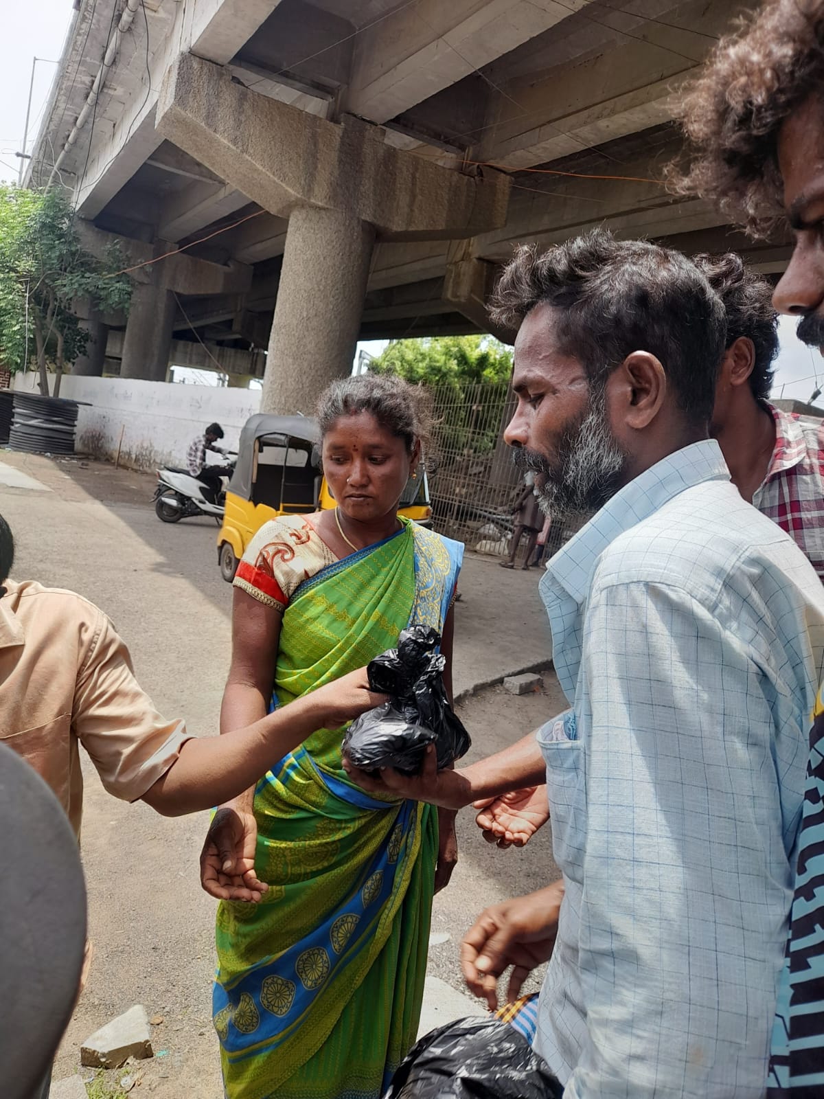 Volunteers with community